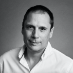 Black and white portrait of photographer Matthew Andrews